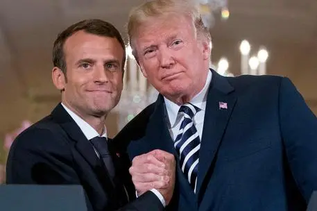 FILE - In this April 24, 2018, file photo, French President Emmanuel Macron and President Donald Trump pose for photos in the White House in Washington. Trump and Macron enjoy putting on a show of exaggerated handshakes, kisses and taps on the back, but they disagree on key issues, including climate change, Iran and world trade. (ANSA/AP Photo/Pablo Martinez Monsivais) [CopyrightNotice: Copyright 2019 The Associated Press. All rights reserved.]