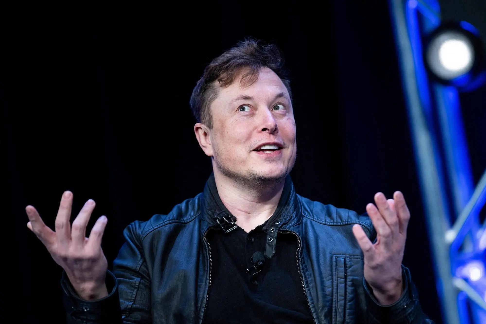 (FILES) In this file photo taken on March 09, 2020: Elon Musk, founder of SpaceX, speaks during the Satellite 2020 at the Washington Convention Center in Washington, DC. - Time Magazine announced that Musk will be their " 2021 Person of the Year" on December 13, 2021. (Photo by Brendan Smialowski / AFP)