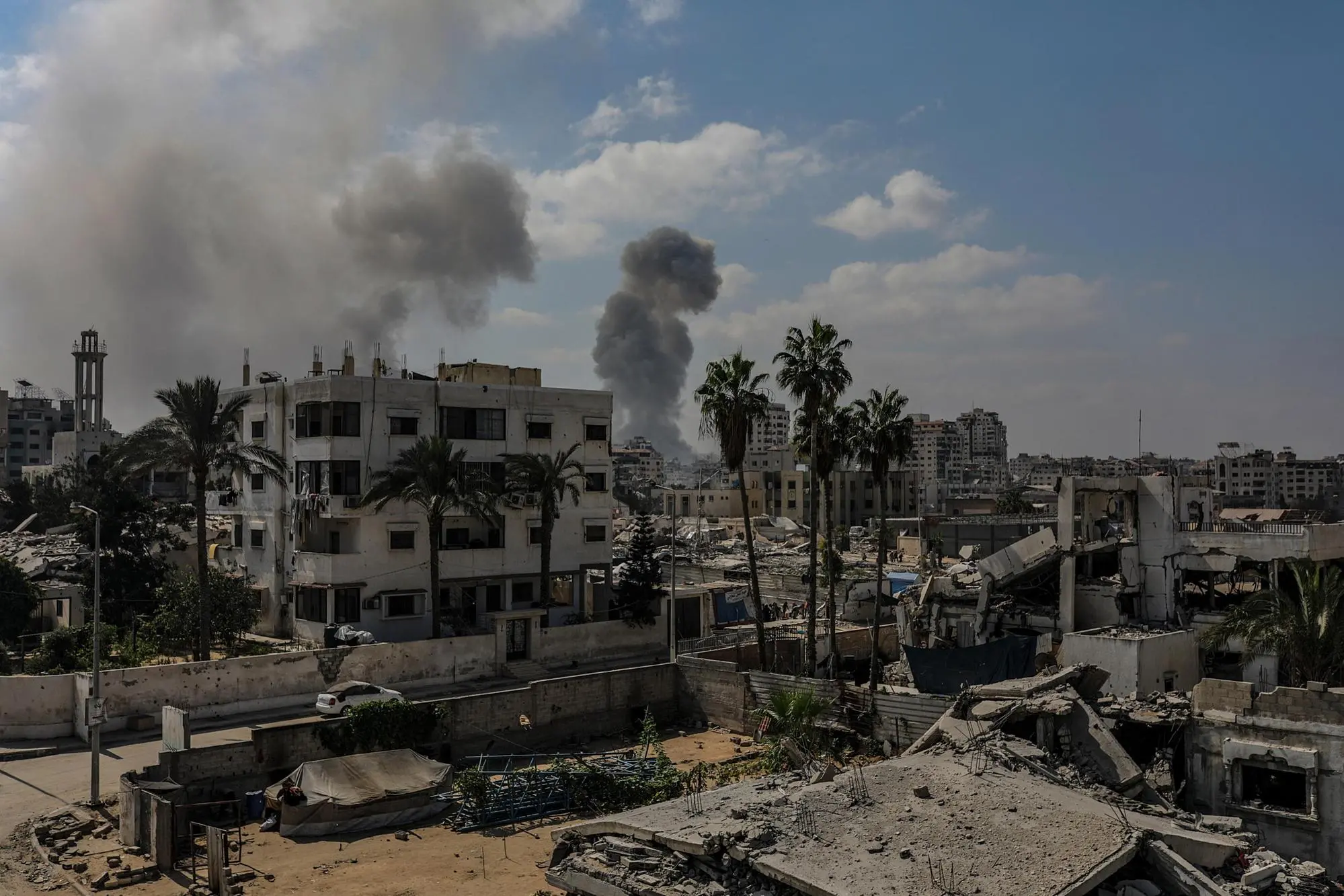 epaselect epa12381665 Smoke rises after an Israeli airstrike in Gaza City, Gaza Strip, 16 September 2025. Israeli Prime Minister Benjamin Netanyahu confirmed at a court appearance that the Israeli military has begun a major operation in Gaza City. More than 64,800 people have been killed in the Gaza Strip since October 2023, according to the Palestinian Ministry of Health. EPA/MOHAMMED SABER