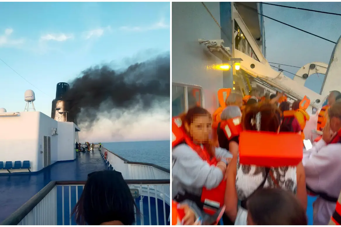 Il fumo nero sulla Gnv e i passeggeri sul ponte con i giubbotti di salvataggio (foto Pala)