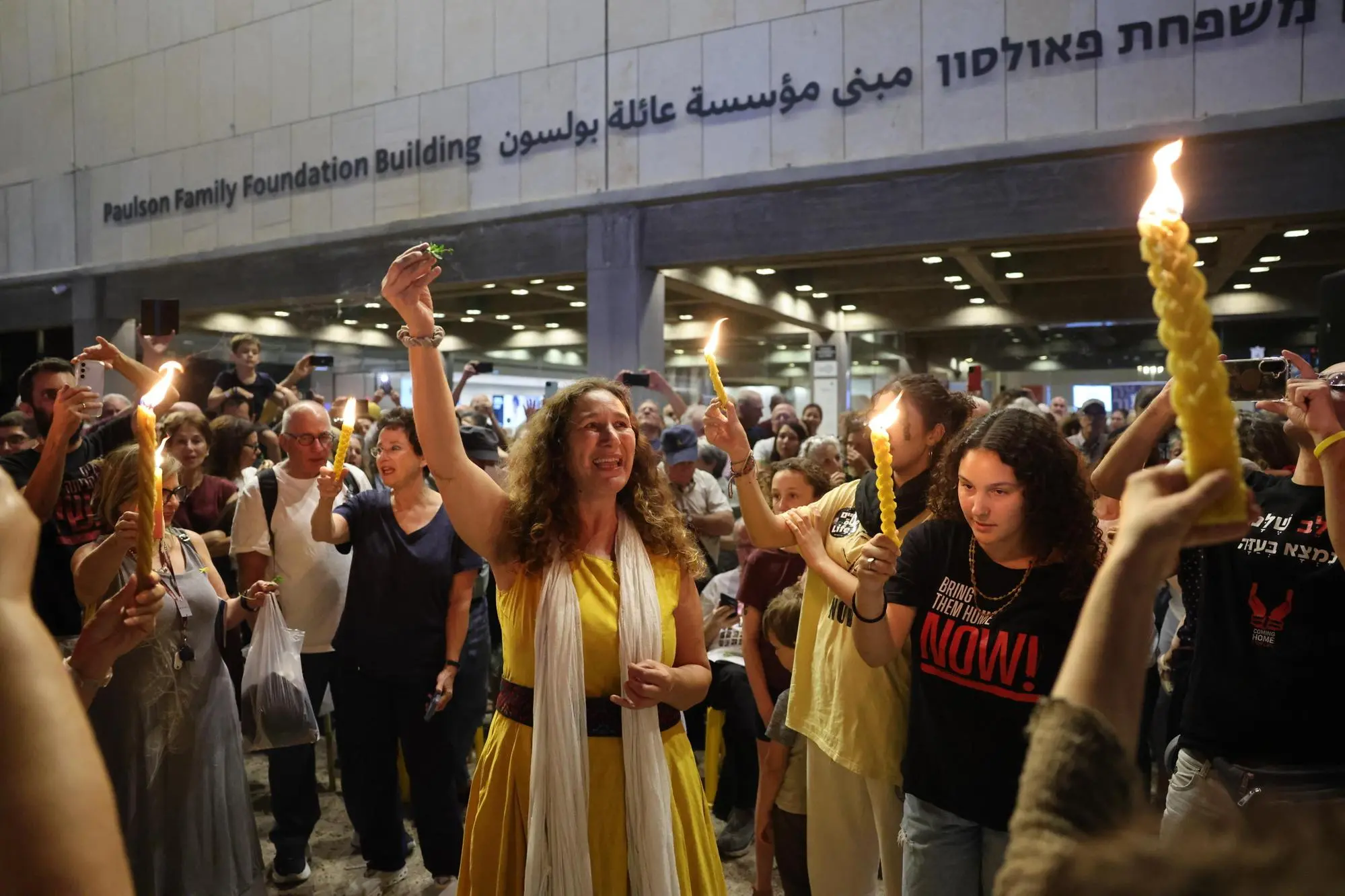 epa12447407 People celebrate during a rally at the so-called 'Hostages Square' outside the Kirya military headquarters in Tel Aviv, Israel, 11 October 2025. Tens of thousands are to gather at the "Hostages Square" ahead of the release of hostages held by Hamas. EPA/ABIR SULTAN