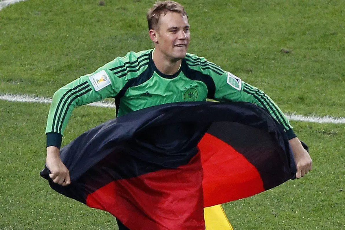 epa04314937 Goalkeeper Manuel Neuer of Germany celebrates after winning the FIFA World Cup 2014 final between Germany and Argentina at the Estadio do Maracana in Rio de Janeiro, Brazil, 13 July 2014. (RESTRICTIONS APPLY: Editorial Use Only, not used in association with any commercial entity - Images must not be used in any form of alert service or push service of any kind including via mobile alert services, downloads to mobile devices or MMS messaging - Images must appear as still images and must not emulate match action video footage - No alteration is made to, and no text or image is superimposed over, any published image which: (a) intentionally obscures or removes a sponsor identification image; or (b) adds or overlays the commercial identification of any third party which is not officially associated with the FIFA World Cup) EPA/CHEMA MOYA EDITORIAL USE ONLY