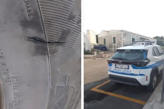 La gomma squarciata all'auto della municipale a Stintino (foto Pala)