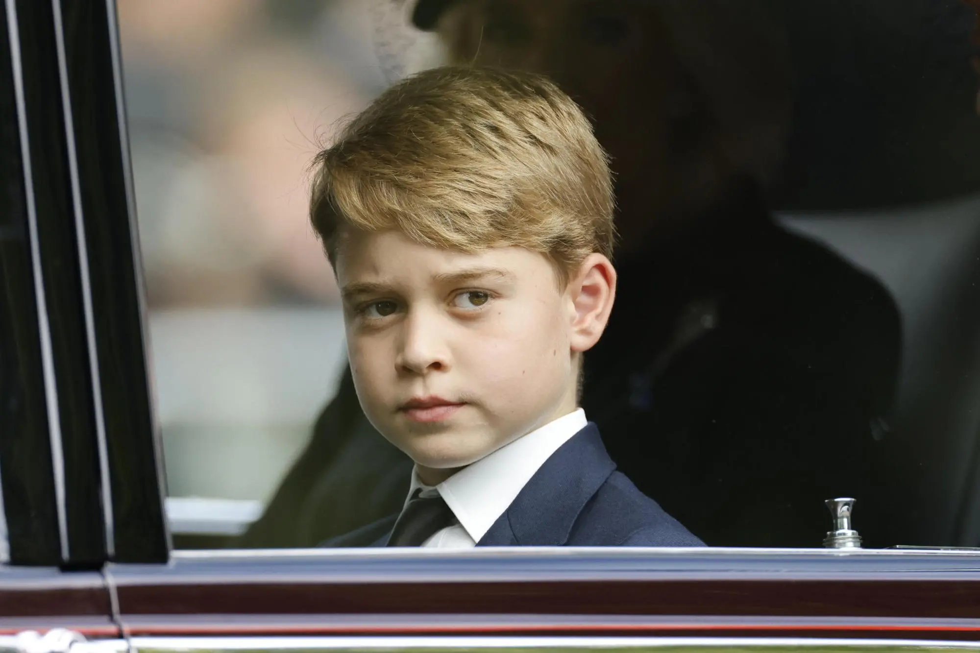 Il principe George ai funerali della bisnonna, la Regina Elisabetta II (Ansa)