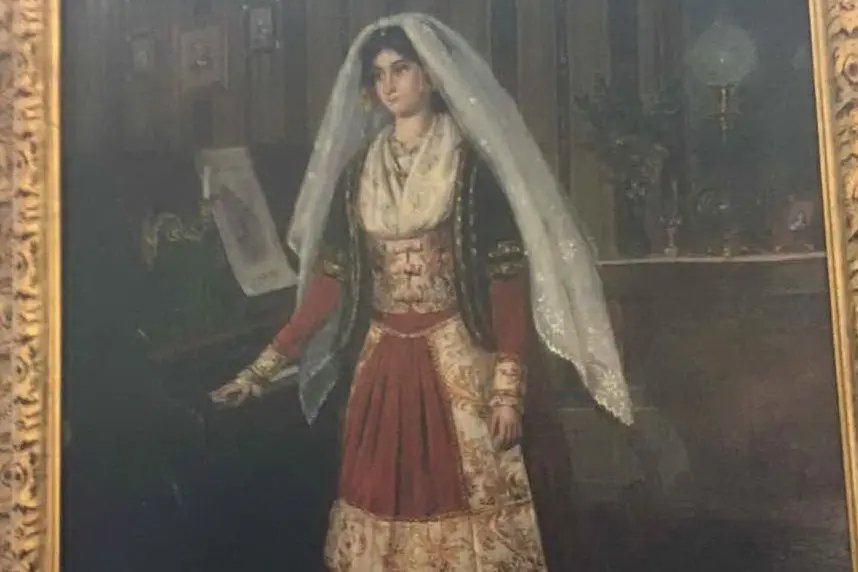 Il quadro: rappresenta il costume di una donna di Quartu?