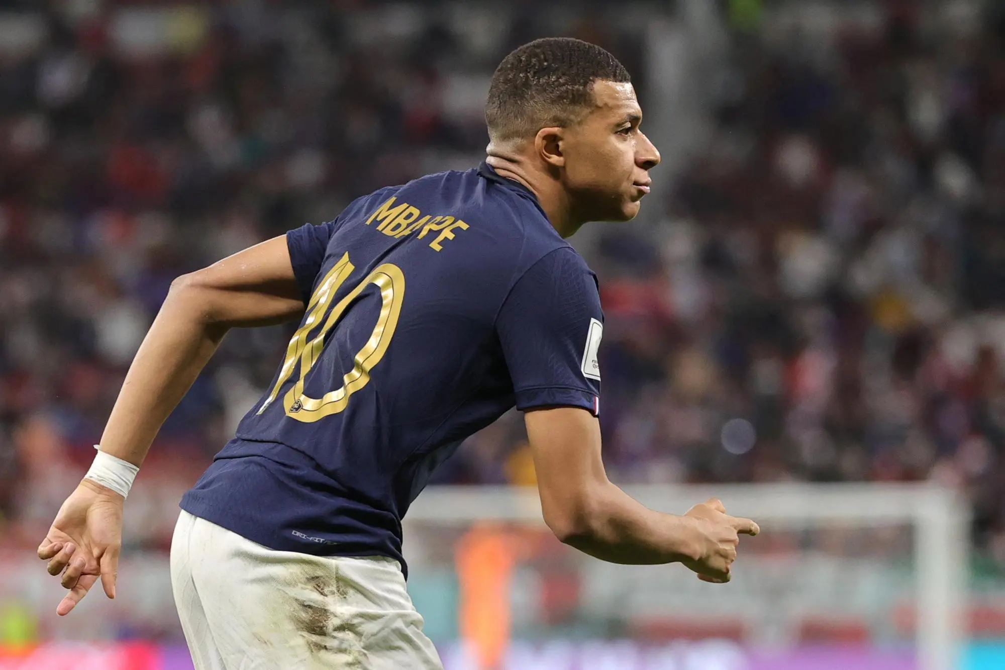 epa10348295 Kylian Mbappe of France celebrates scoring the 3-0 lead during the FIFA World Cup 2022 round of 16 soccer match between France and Poland at Al Thumama Stadium in Doha, Qatar, 04 December 2022. EPA/Friedemann Vogel