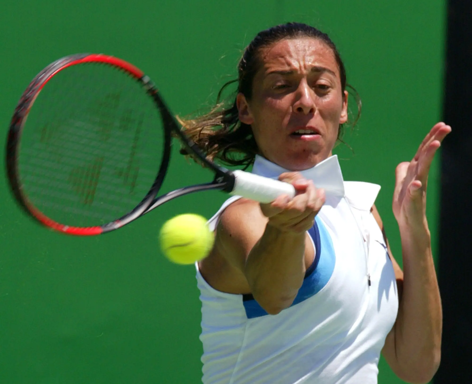 Italy's Francesca Schiavone, seeded 14th, makes a forehand return during his first round match against Marta Marrero of Spain at the Australian Open at Melbourne Park, Melbourne, Australia, Tuesday, Jan. 18, 2005. Schiavone won the match, 6-3, 6-2. (AP Photo/Tony Feder)