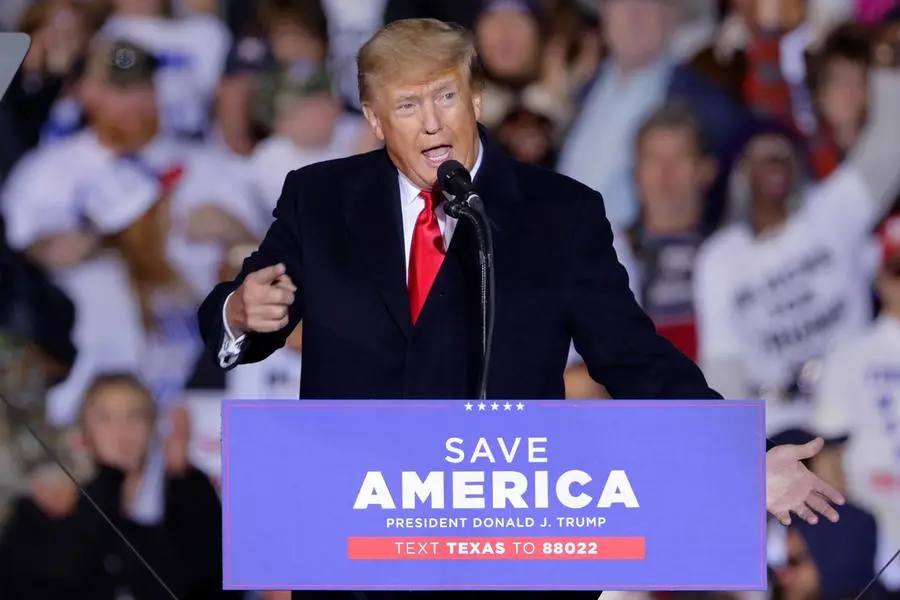 epa09717407 Former US president Donald Trump speaks at a Save America Rally, held outdoors at the Montgomery County Fairgrounds in Conroe, Texas, USA, 29 January 2022. Trump has been holding rallies at various locations as mid-term election races heat up. EPA/MICHAEL WYKE