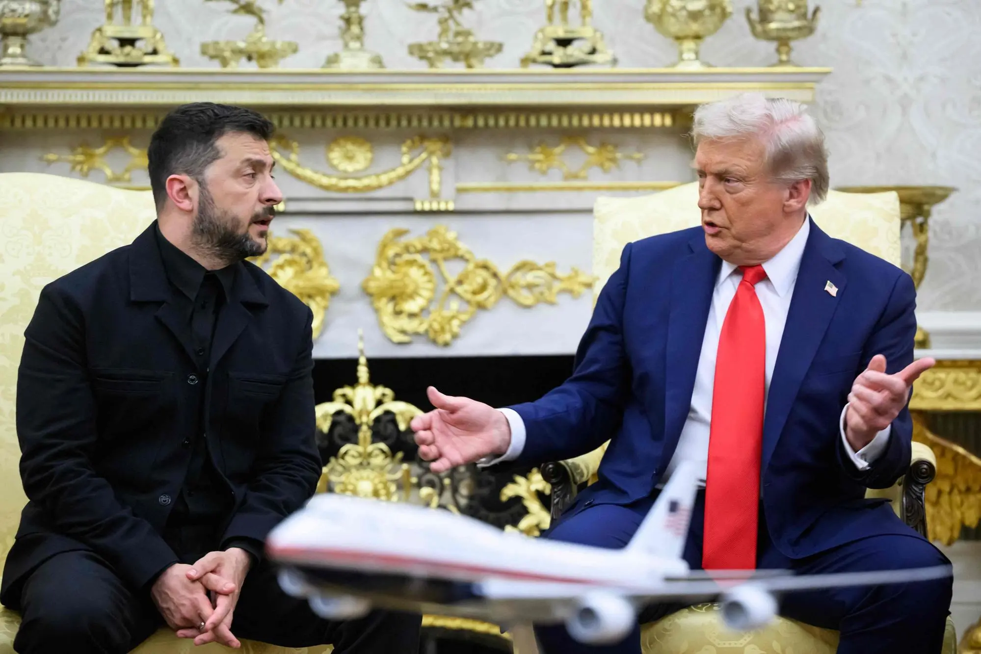 Ukrainian President Volodymyr Zelensky and US President Donald Trump participate in a meeting in the Oval Office of the White House in Washington, DC, on August 18, 2025. European leaders join Ukrainian President Volodymyr Zelensky in talks with US President Donald Trump on August 18, as they try to find a way to end Russia's offensive. The leaders heading to Washington on Monday to appear alongside Zelensky call themselves the "coalition of the willing." (Photo by Mandel NGAN / AFP)