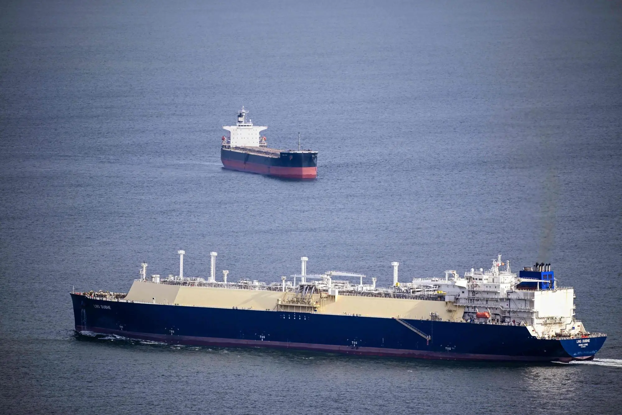 The vessel Lng Dubhe, a LNG tanker sailing under the flag of Hong Kong, leaves the Port of Bilbao after her stopover at the Bizkaia Bay Gas (BBG) regasification plant in the Spanish Basque city of Zierbena on March 9, 2026. The US-Israeli war on Iran has expanded across the Gulf and beyond, upending global energy markets and trade, and virtually halting traffic in the Strait of Hormuz, through which a fifth of the world's crude oil travels. (Photo by ANDER GILLENEA / AFP)