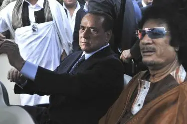 Il presidente del Consiglio Silvio Berlusconi ed il leader libico, Muammar Gheddafi