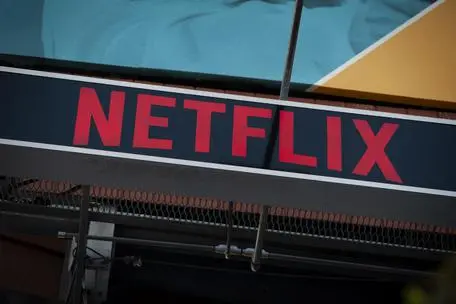 epa07932006 A Netflix billboard hangs above the Sunset Strip in Los Angeles, California, USA, 18 October 2019. On 17 October 2019 Netflix reported earnings of 1.47 US dollar per share, compared to analysts estimates of 1.05 US dollar per share. EPA/CHRISTIAN MONTERROSA