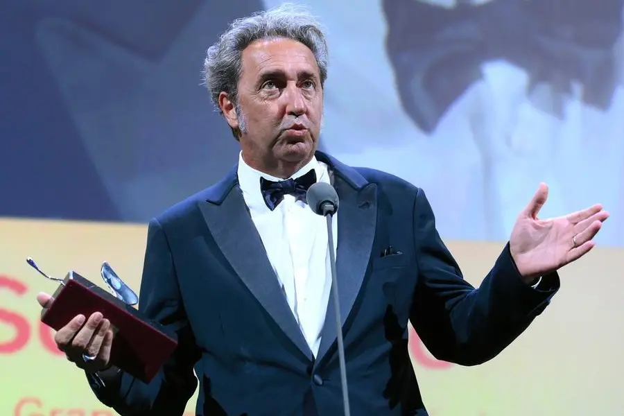 Italian director Paolo Sorrentino holds the Silver Lion - Grand Jury Prize for "E stato la mano di Dio" (The Hand of God) during the closing ceremony of the 78th Venice Film Festival on September 11, 2021 at Venice Lido. ANSA/CLAUDIO ONORATI