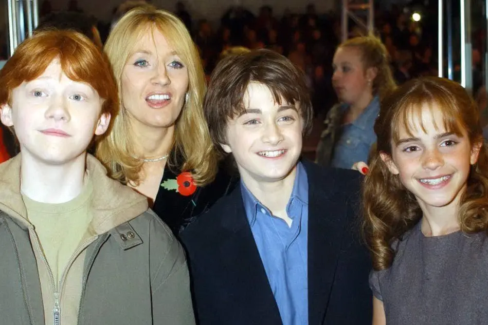 Daniel Radcliffe, al centro, con Rupert Grint, JK Rowling ed Emma Watson (Ansa)
