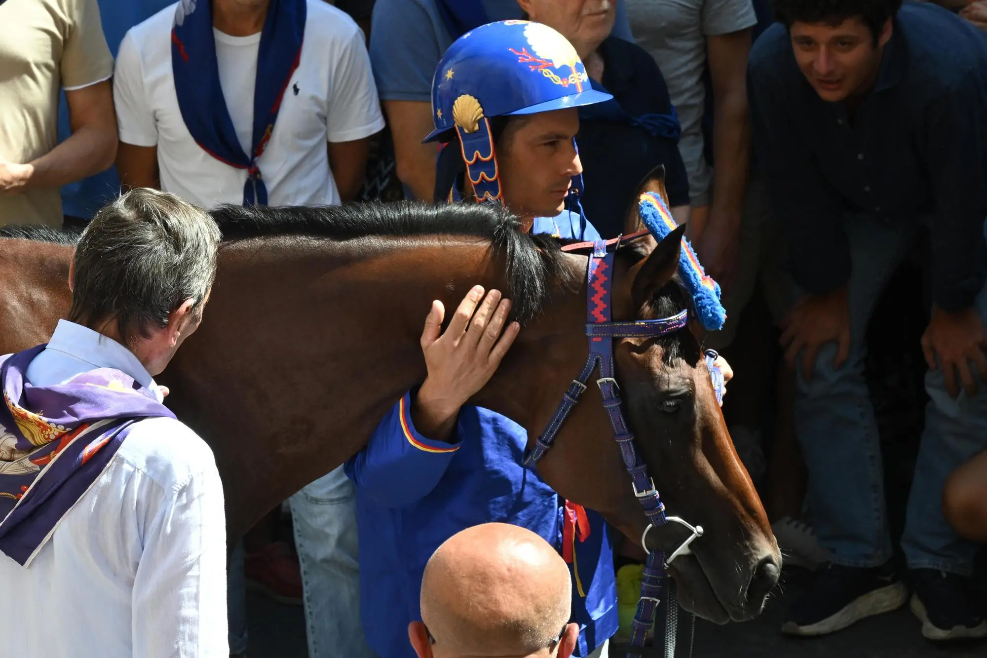 Tittia con Anda e Bola prima della gara (Ansa-Giovannini)