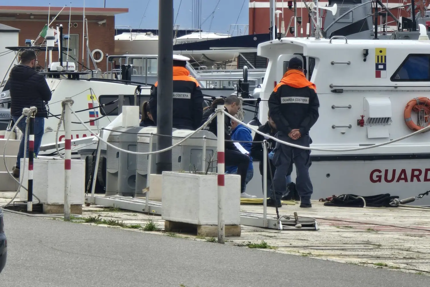 L'arrivo del corpo in banchina al porto