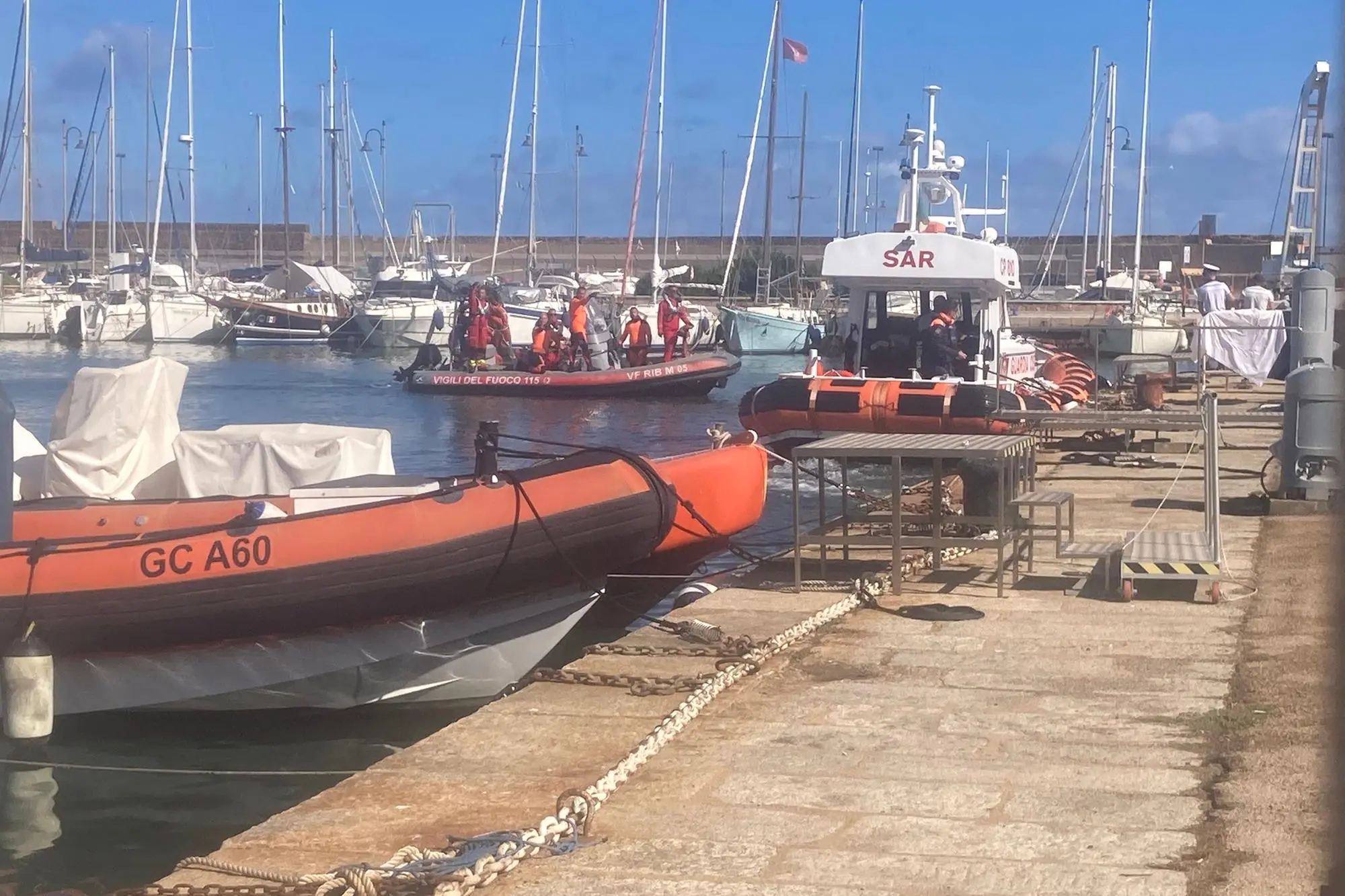 L'arrivo della salma a Porto Torres (foto Pala)