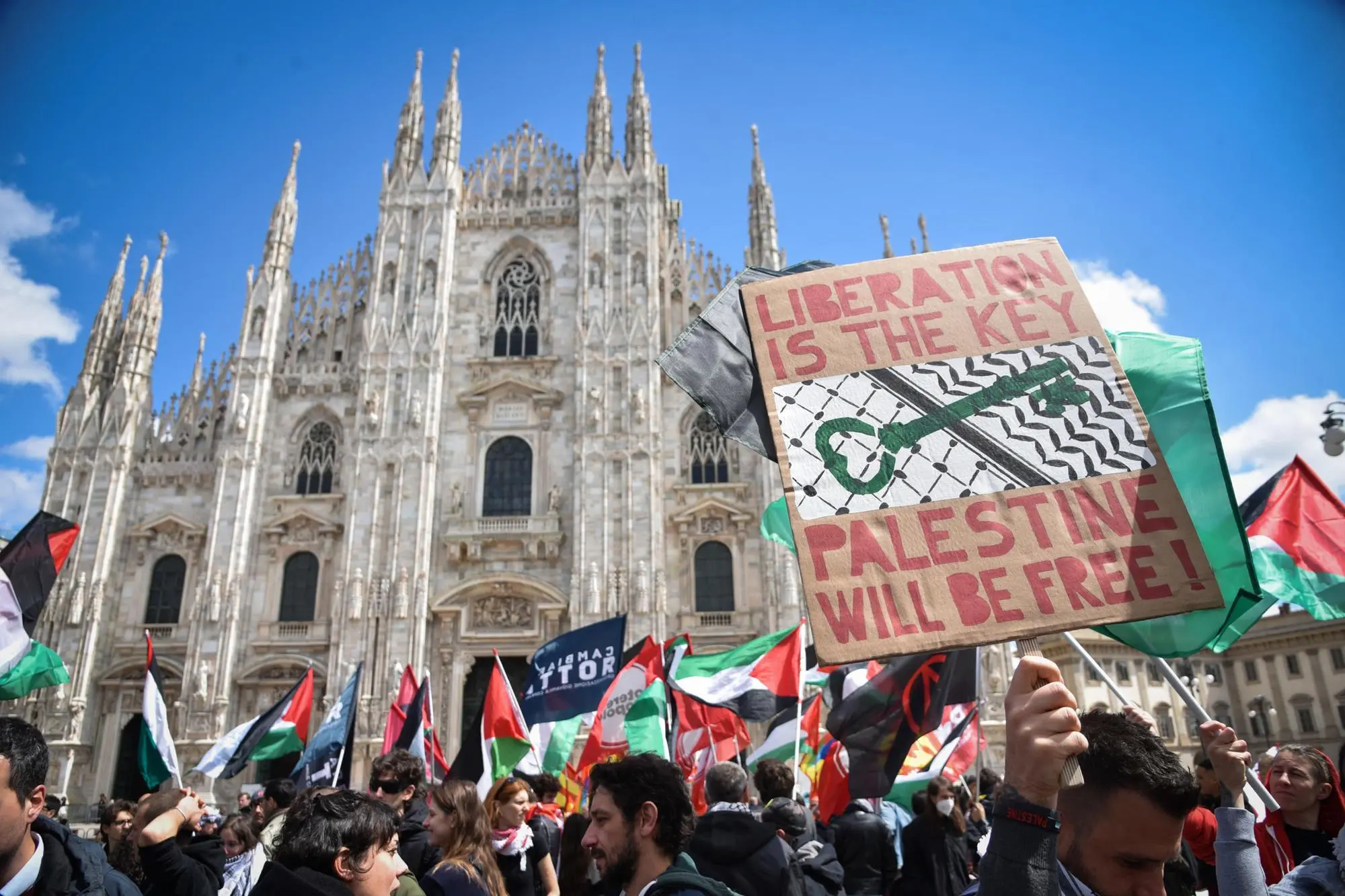 Pro Palestinian people attend a demonstration during commemoration ceremony marking the 79th Liberation Day (Festa della Liberazione) in Milan, Italy, 25 April 2024. Liberation Day (Festa della Liberazione) is a nationwide public holiday in Italy that is annually celebrated on 25 April. The day remembers Italians who fought against the Nazis and Mussolini's troops during World War II and honors those who served in the Italian Resistance. ANSA/MATTEO CORNER