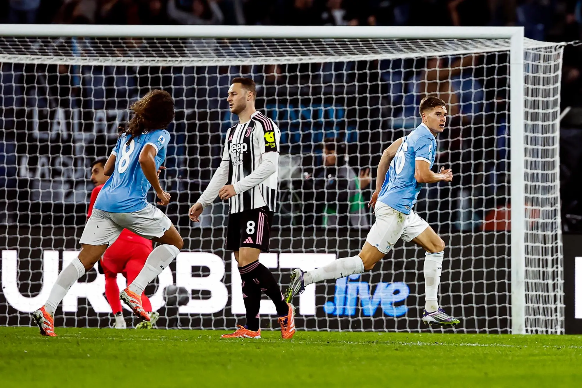 Lazio’s Toma Basic jubilates with his teammates after scoring the 0-0 goal during the Italian Serie A soccer match SS Lazio vs Juventus FC at Olimpico stadium in Rome, Italy, 26 October 2025. ANSA/ANGELO CARCONI
