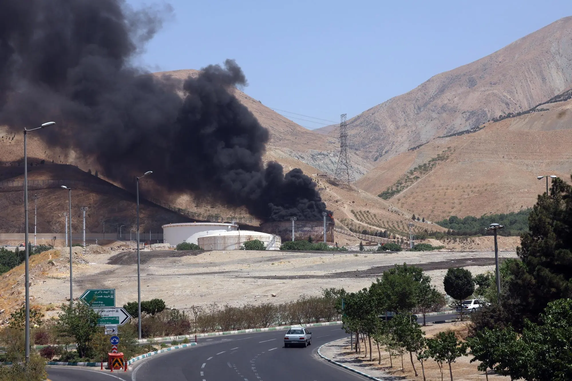 epaselect epa12178552 Smoke rises from an oil refinery, northwest of Tehran, Iran, 16 June 2025. Israel and Iran have been exchanging fire since Israel launched strikes across Iran on 13 June 2025 as part of Operation 'Rising Lion.' EPA/ABEDIN TAHERKENAREH