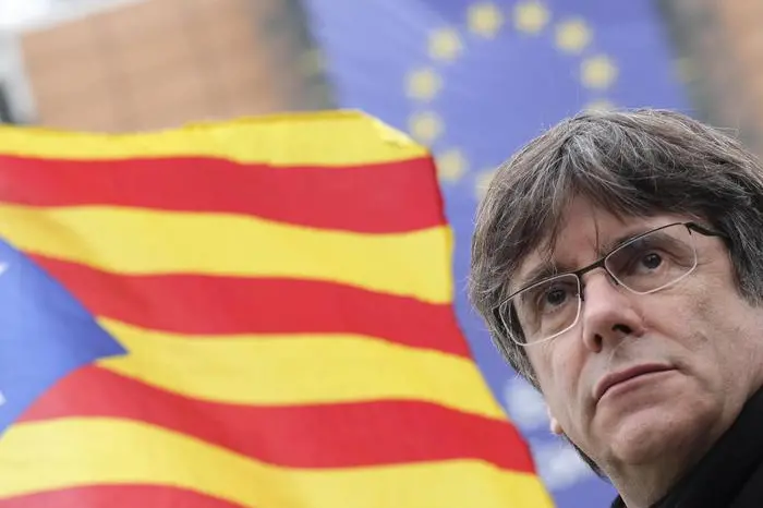 epa07922225 Ousted former Catalan leader Carles Puigdemont takes part in a protest with Catalan supporters in Brussels, Belgium, 15 October 2019. The Spanish Supreme Court on 14 October 2019 issued a fresh European arrest warrant for the deposed former president following its sentencing of former Catalan Vice President Oriol Junqueras to 13 years in jail for sedition and misuse of public funds. Several other political leaders were also handed multi-year prison sentences for their roles in holding a failed independence vote in 2017. EPA/OLIVIER HOSLET
