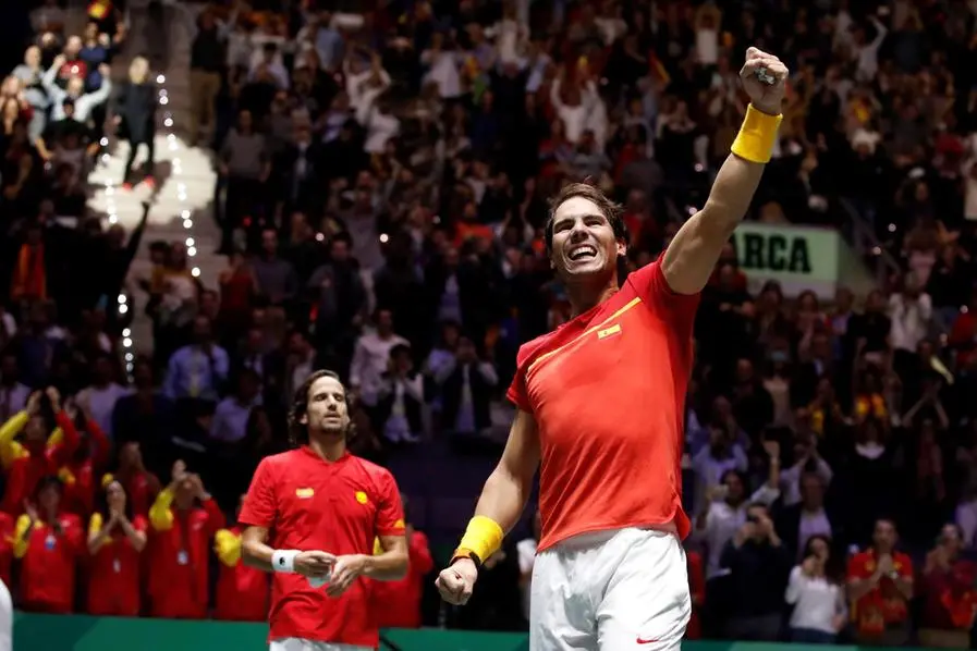 epa08020990 Spanish tennis player Rafa Nadal celebrated after win against British Jamie Murray and Neal Skupski during the third double match of the Davis Cup's semifinal between Spain and Great Britain at Caja Magica stadium in Madrid, Spain on 23 November 2019. EPA/Juanjo Martin