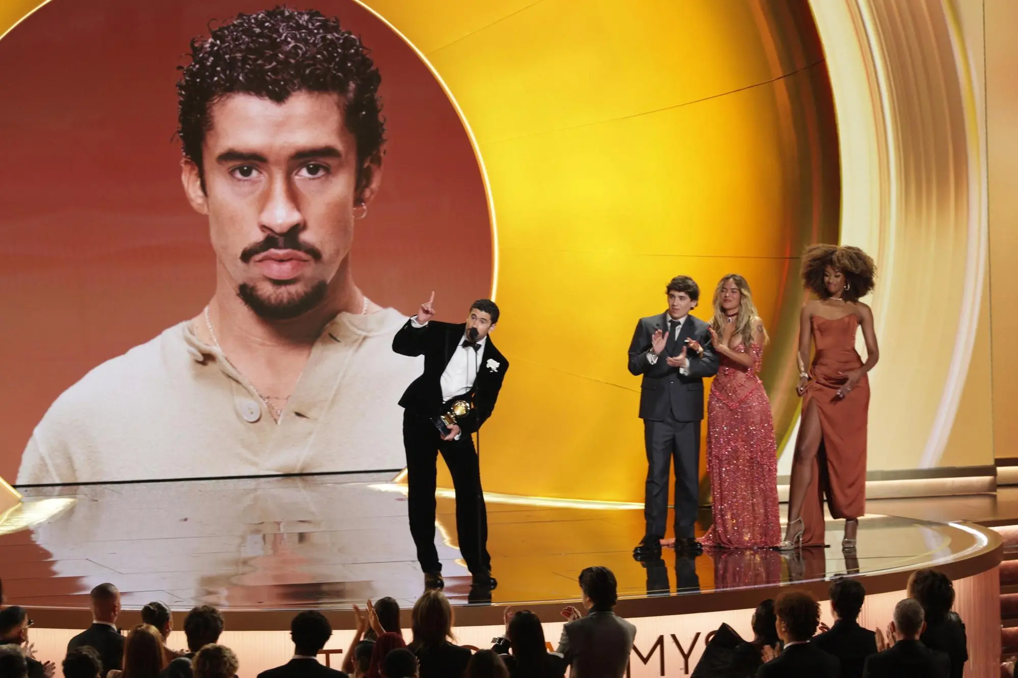 epaselect epa12699354 Puerto Rican singer Bad Bunny (L) speaks as he accepts the Grammy for Best Musica Urbana Album onstage during the 68th annual Grammy Awards ceremony at Crypto.com Arena in Los Angeles, California, USA, 01 February 2026. EPA/CHRIS TORRES