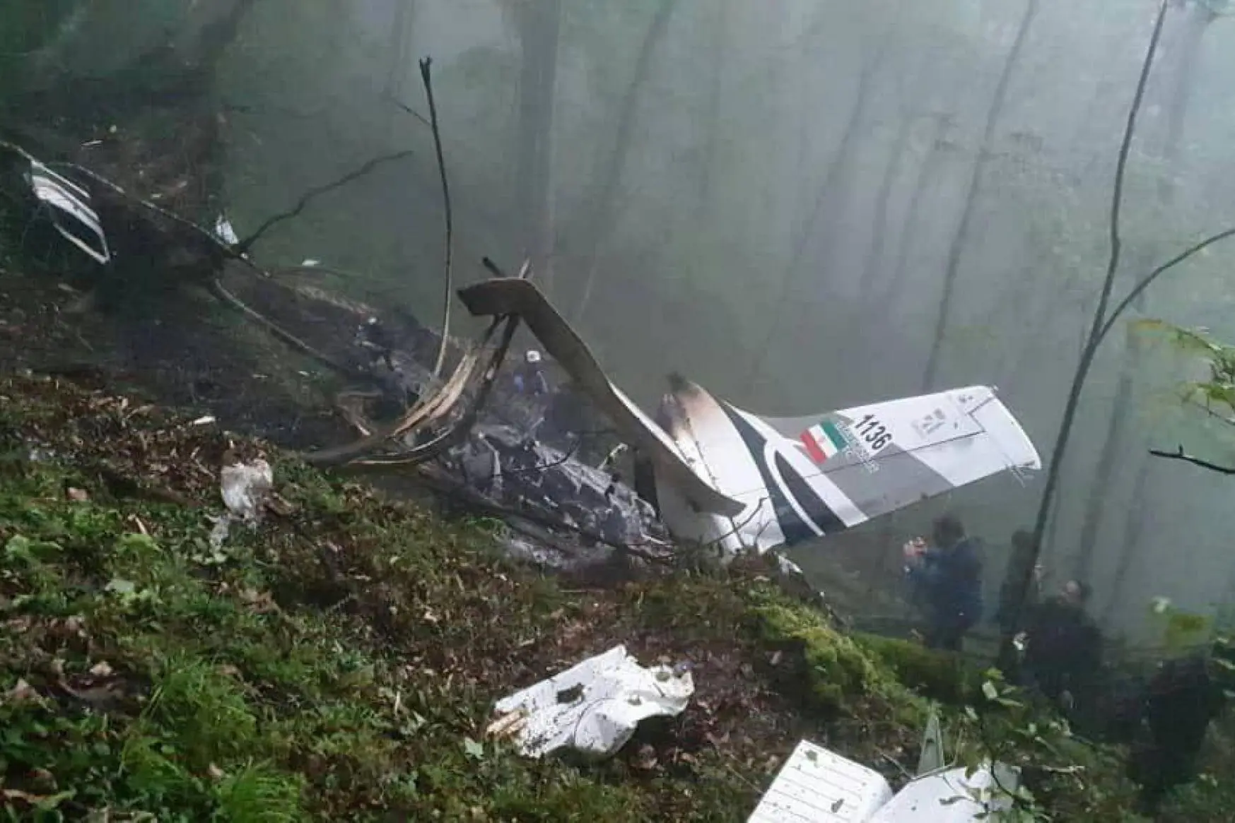 epa11354652 A handout photo made available by Iranian state TV (IRIB) shows the wreckage of a helicopter carrying Iranian President Ebrahim Raisi in the mountainous Varzaghan area, Iran, 20 May 2024. According to Iranian state media, President Raisi, Foreign Minister Hossein Amir Abdolahian and several others were killed in the crash. Raisi was returning after an inauguration ceremony of the joint Iran-Azerbaijan constructed Qiz-Qalasi dam at the Aras River. EPA/Iranian state TV (IRIB) HANDOUT EDITORIAL USE ONLY/NO SALES HANDOUT EDITORIAL USE ONLY/NO SALES