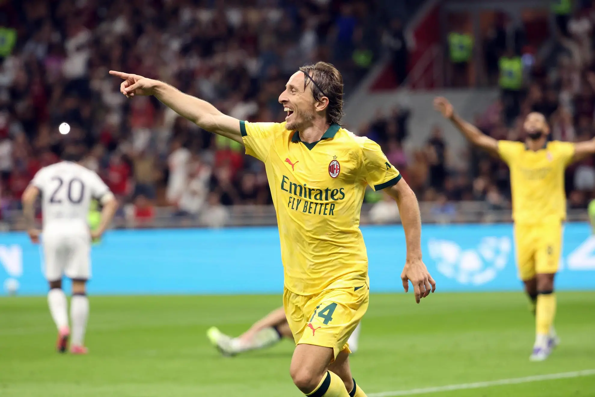 Ac Milan's Luka Modri? jubilates after scoring goal of 1 to 0 during the Italian serie A soccer match between Milan and Bologna at Giuseppe Meazza stadium in Milan, 14 September 2025. ANSA / MATTEO BAZZI