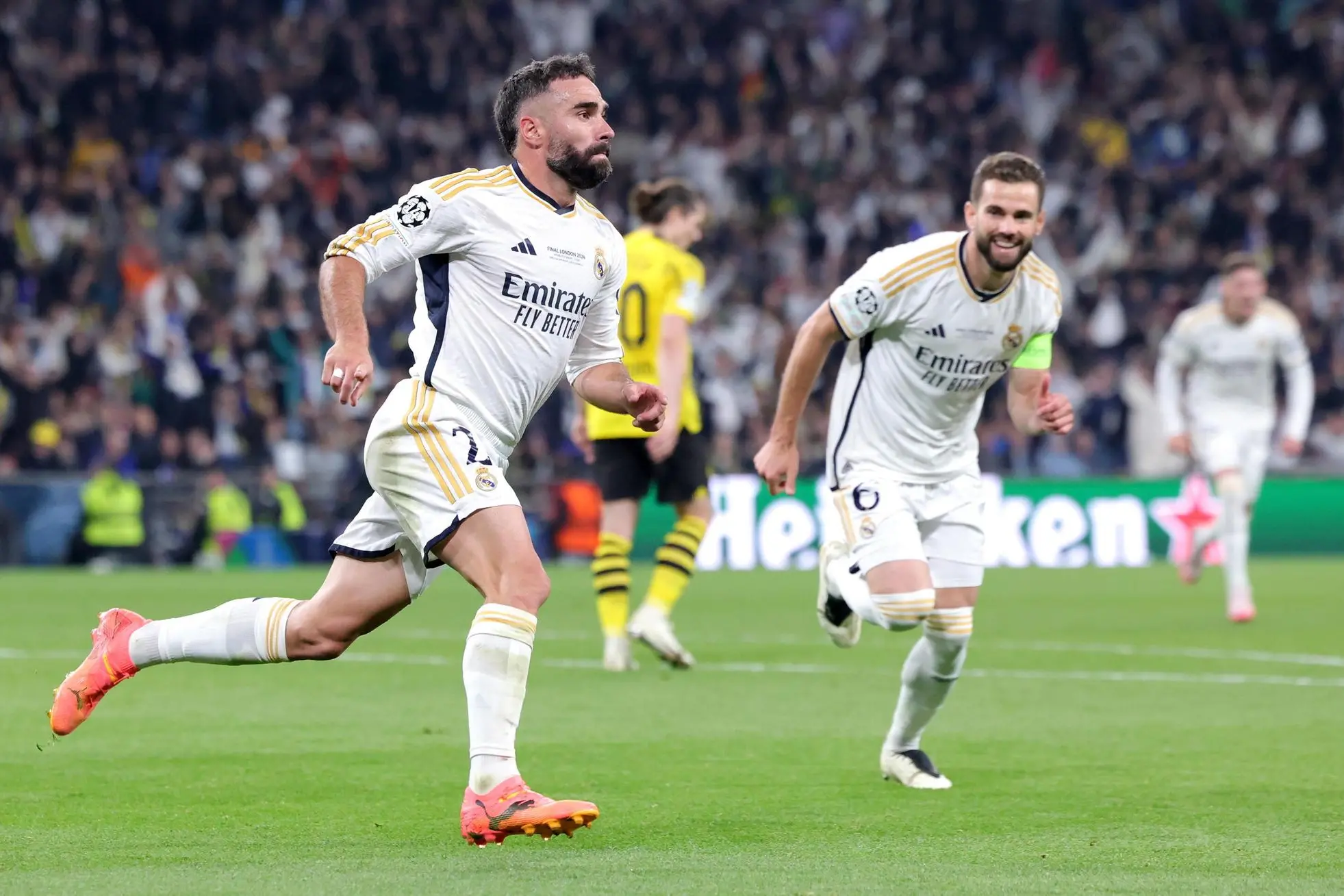 epa11384602 Dani Carvajal of Madrid celebrates after scoring the opening goal during the UEFA Champions League final match of Borussia Dortmund against Real Madrid, in London, Britain, 01 June 2024. EPA/NEIL HALL