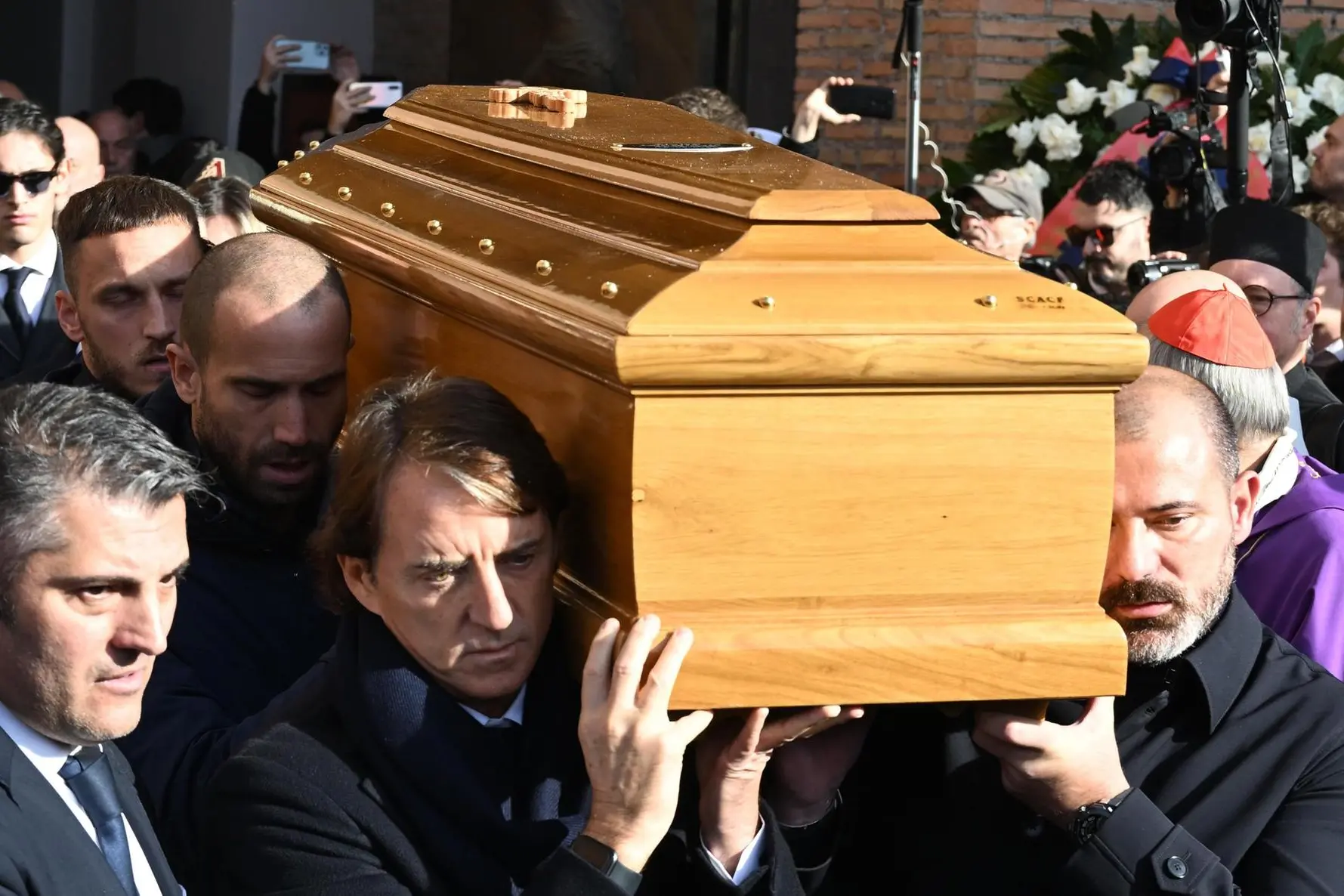 The coffin as he leaves the church at the end of funerals ceremony of Sinisa Mihajlovic at Santa Maria degli Angeli in Rome, 19 December 2022. ANSA/CLAUDIO PERI