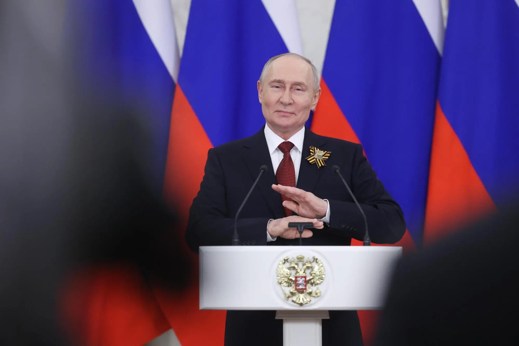 epa12944478 Russian President Vladimir Putin gestures speaking with media following his meeting with foreign delegations at the Kremlin in Moscow, Russia, 09 May 2026. Russia marks the 81 st anniversary of its victory over Nazi Germany and its allies in World War II. EPA/MAXIM SHIPENKOV / POOL