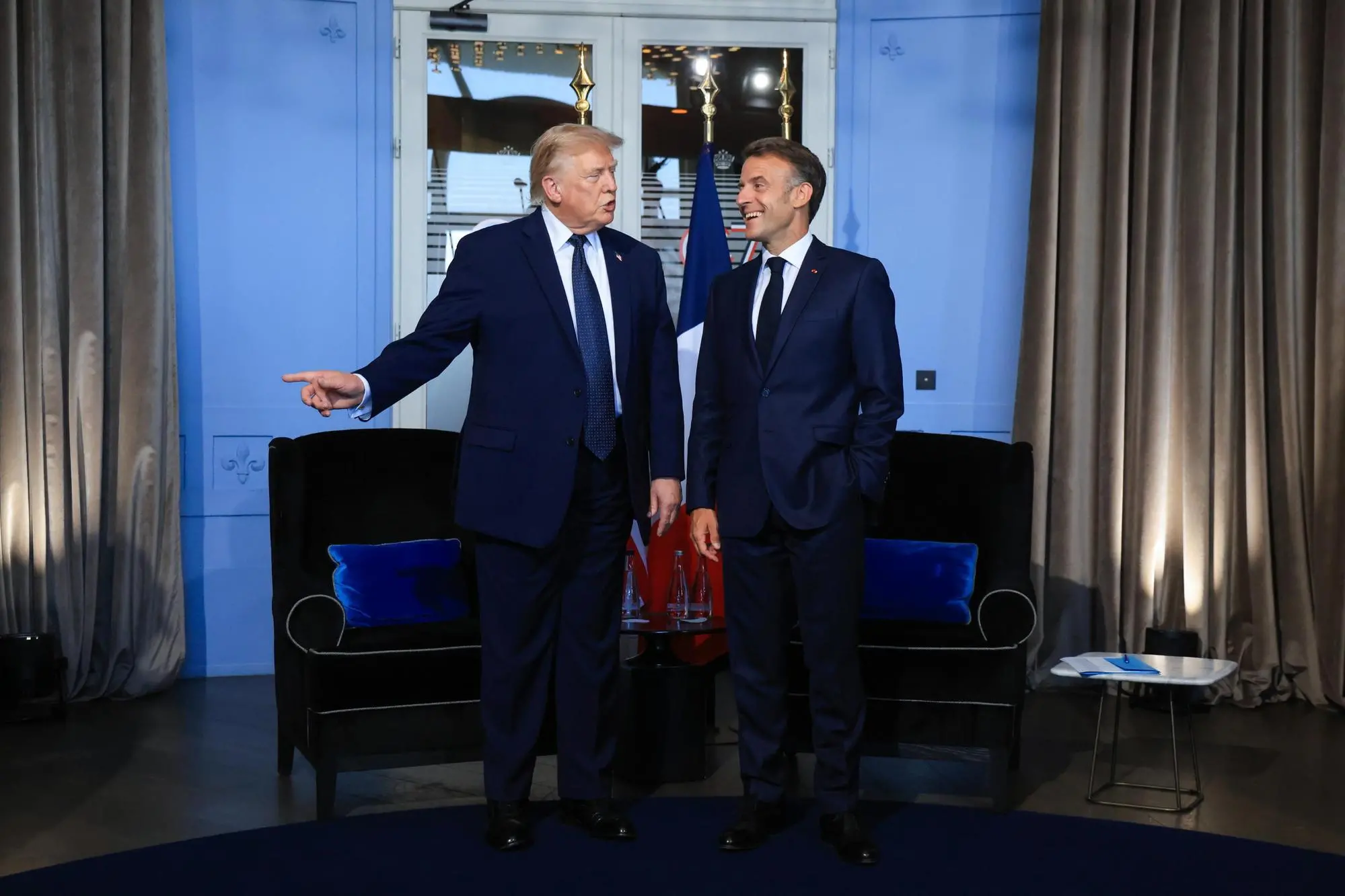 epa13039456 US President Donald Trump (L) attends a bilateral meeting with French President Emmanuel Macron on the sidelines of the G7 summit in Evian-les-Bains, central-eastern France, 15 June 2026. The 52nd G7 Summit takes place in Evian-les-Bains from 15 to 17 June 2026. EPA/LUDOVIC MARIN / POOL MAXPPP OUT