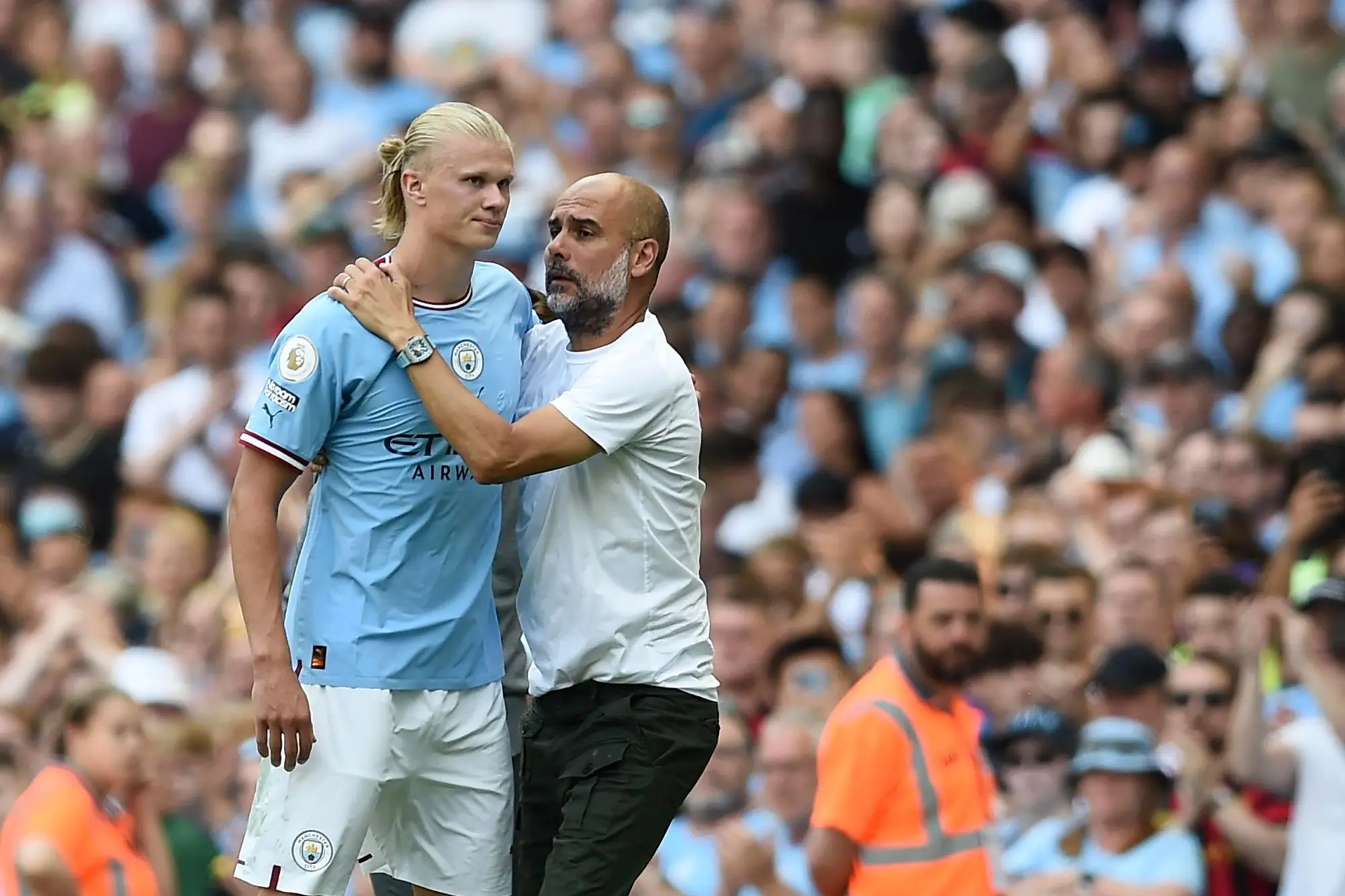 epa10118962 Manchester City manager Pep Guardiola (R) hugs his player Erling Haaland (L) after substitution during the English Premier League soccer match between Manchester City and AFC Bournemouth in Manchester, Britain, 13 August 2022. EPA/PETER POWELL EDITORIAL USE ONLY. No use with unauthorized audio, video, data, fixture lists, club/league logos or 'live' services. Online in-match use limited to 120 images, no video emulation. No use in betting, games or single club/league/player publications