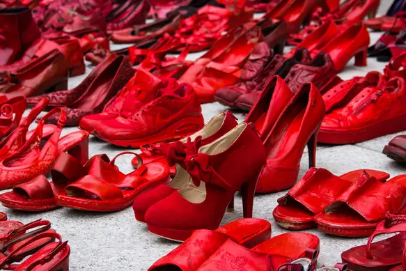 CAGLIARI, ITALY - NOVEMBER 25, 2017: Zapatos rojos by Elina Chauvet near Piazza Garibaldi - Sardinia