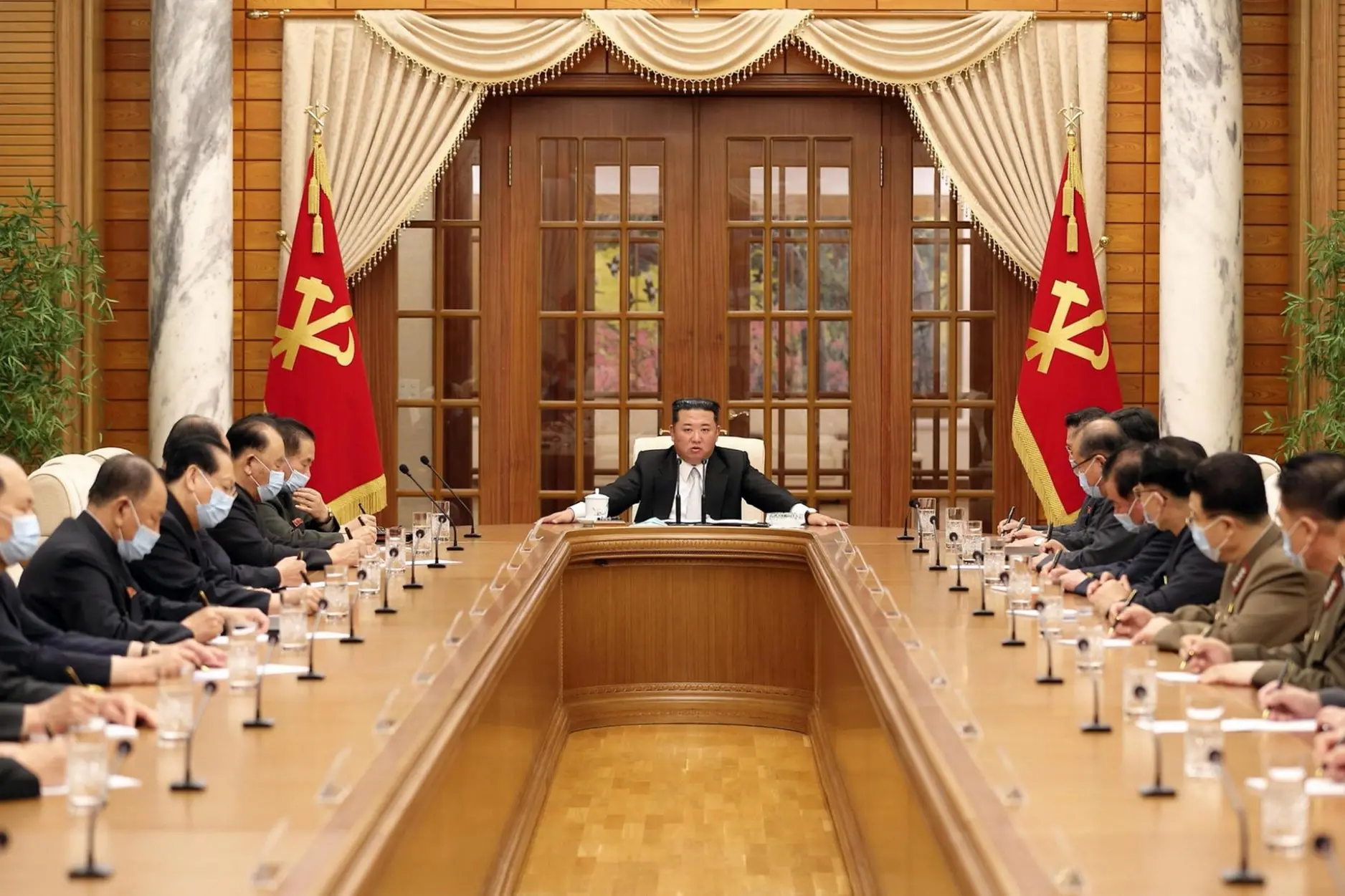 epa09941460 A photo released by the official North Korean Central News Agency (KCNA) shows the meeting of the 8th Political Bureau of 8th Central Committee of the WPK, convened at the office building of the Party Central Committee in Pyongyang, North Korea, 12 May 2022. Kim Jong-un (C), general secretary of the Workers' Party of Korea (WPK), presented at the meeting, held to organize the government's response to an outbreak of COVID-19 in Pyongyang. EPA/KCNA EDITORIAL USE ONLY