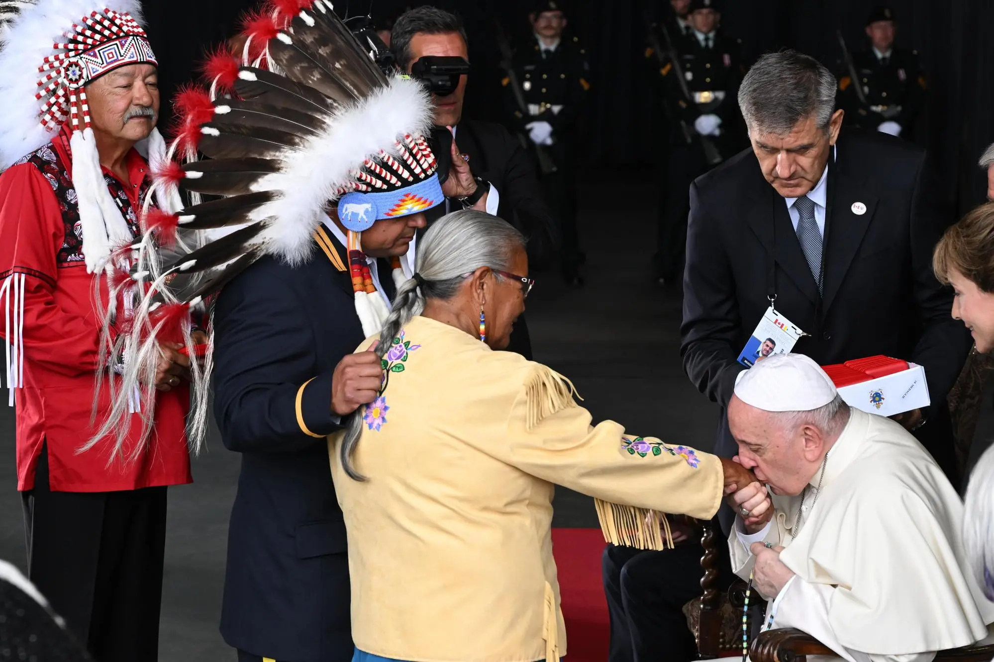 Pope Francis meets members of an indigenous tribe during his welcoming ceremony at Edmonton International Airport in Alberta, western Canada,24 July 2022. The five-days visit is the first papal visit to Canada in 20 years. ANSA/CIRO FUSCO