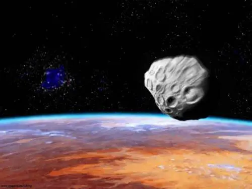 Un asteroide sorvola la Terra in una simulazione grafica (archivio L'Unione Sarda)