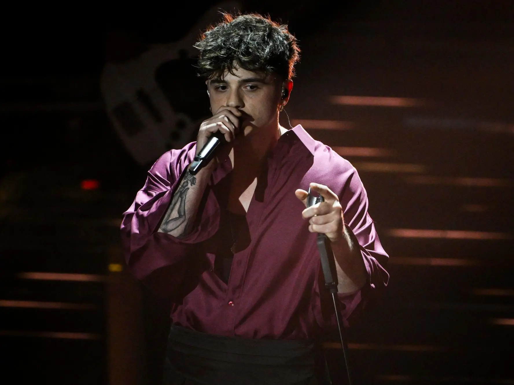 Italian singer Olly performs on stage at the Ariston theatre during the 76th edition of the Sanremo Italian Song Festival, in Sanremo, Italy, 24 February 2026. The music festival will run from 24 to 28 February 2026. ANSA/ETTORE FERRARI