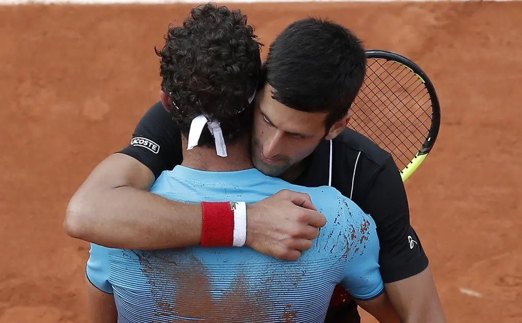 L'abbraccio con Djokovic