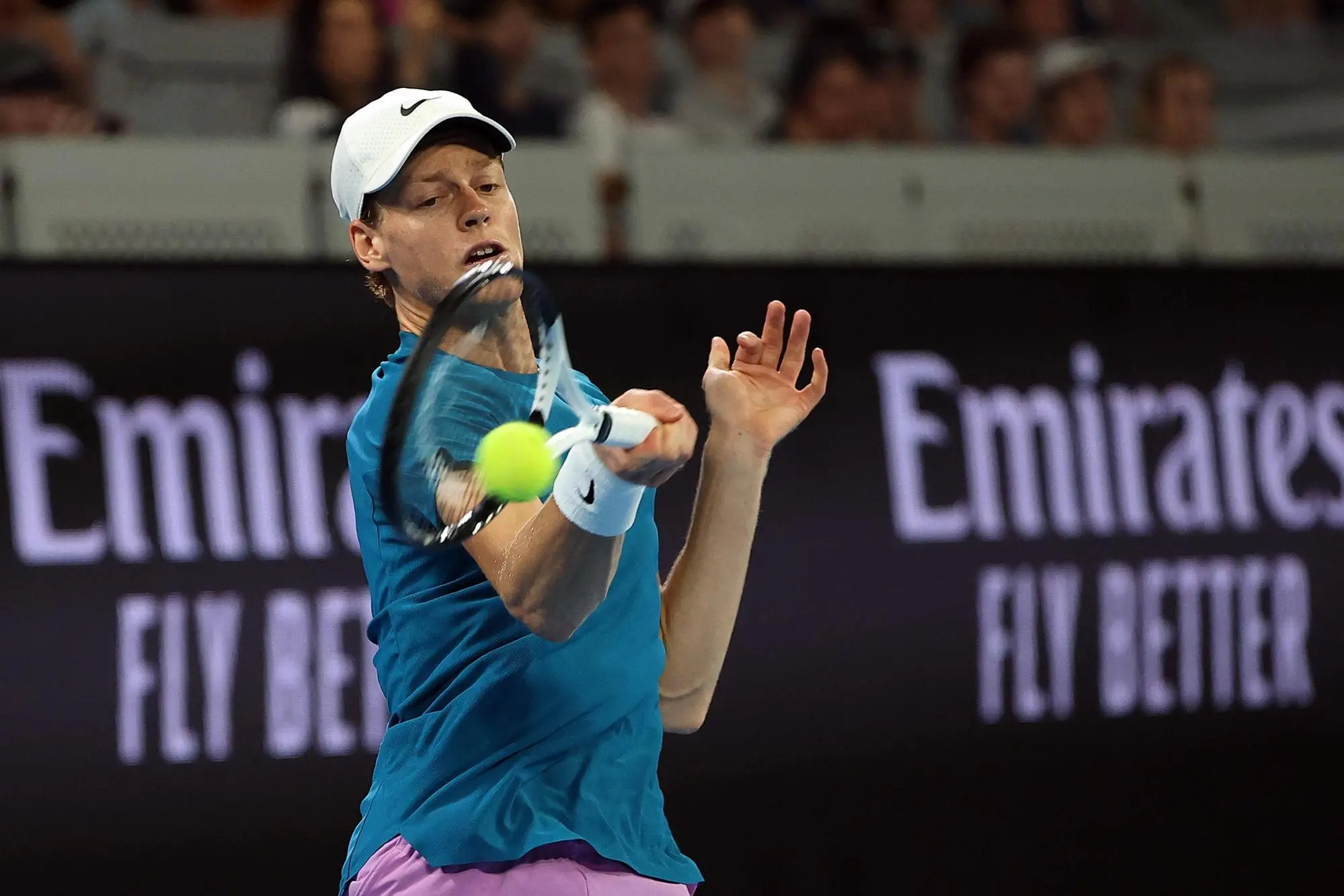epa10411940 Jannik Sinner of Italy in action against Tomas Martin Etcheverry of Argentina during their second round match at the Australian Open tennis tournament in Melbourne, Australia, 18 January 2023. EPA/FAZRY ISMAIL