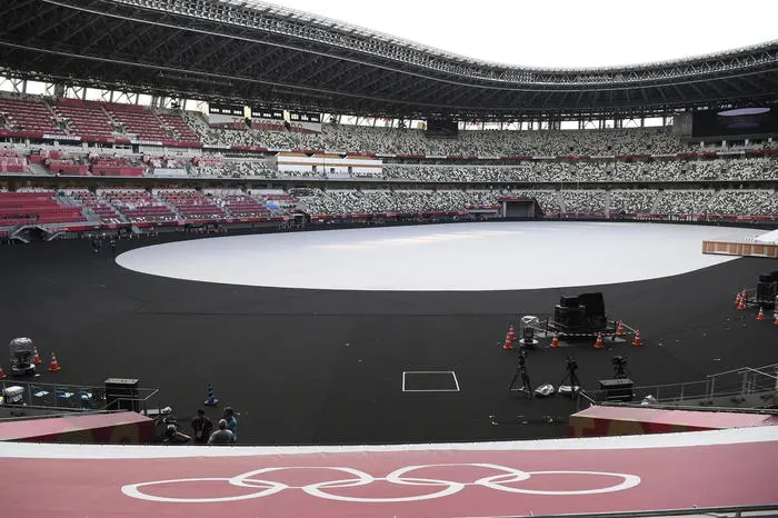 epa09345736 A view of the empty National Stadium, the main stadium of the 2020 Tokyo Olympic Games, in Tokyo, Japan, 15 July 2021. The pandemic-delayed 2020 Summer Olympics are schedule to open on July 23 with spectators banned from most Olympic events due to COVID-19 surge. EPA/Tamas Kovacs HUNGARY OUT