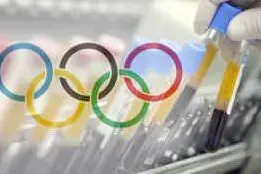 I cinque cerchi olimpici e i campioni raccolti