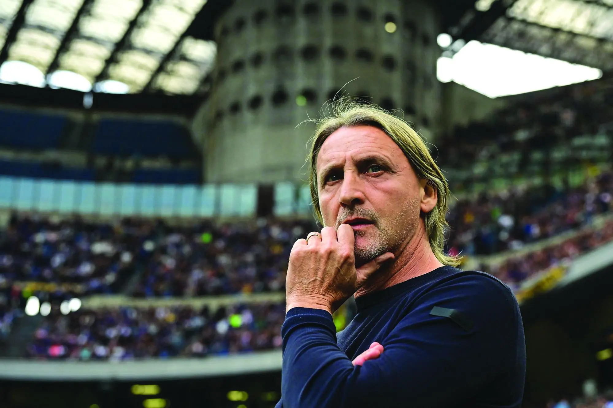Cagliari's Italian head coach Davide Nicola looks on during the Italian Serie A football match between Inter Milan and Cagliari at San Siro stadium in Milan, Italy on April 12, 2025. (Photo by Piero CRUCIATTI / AFP)