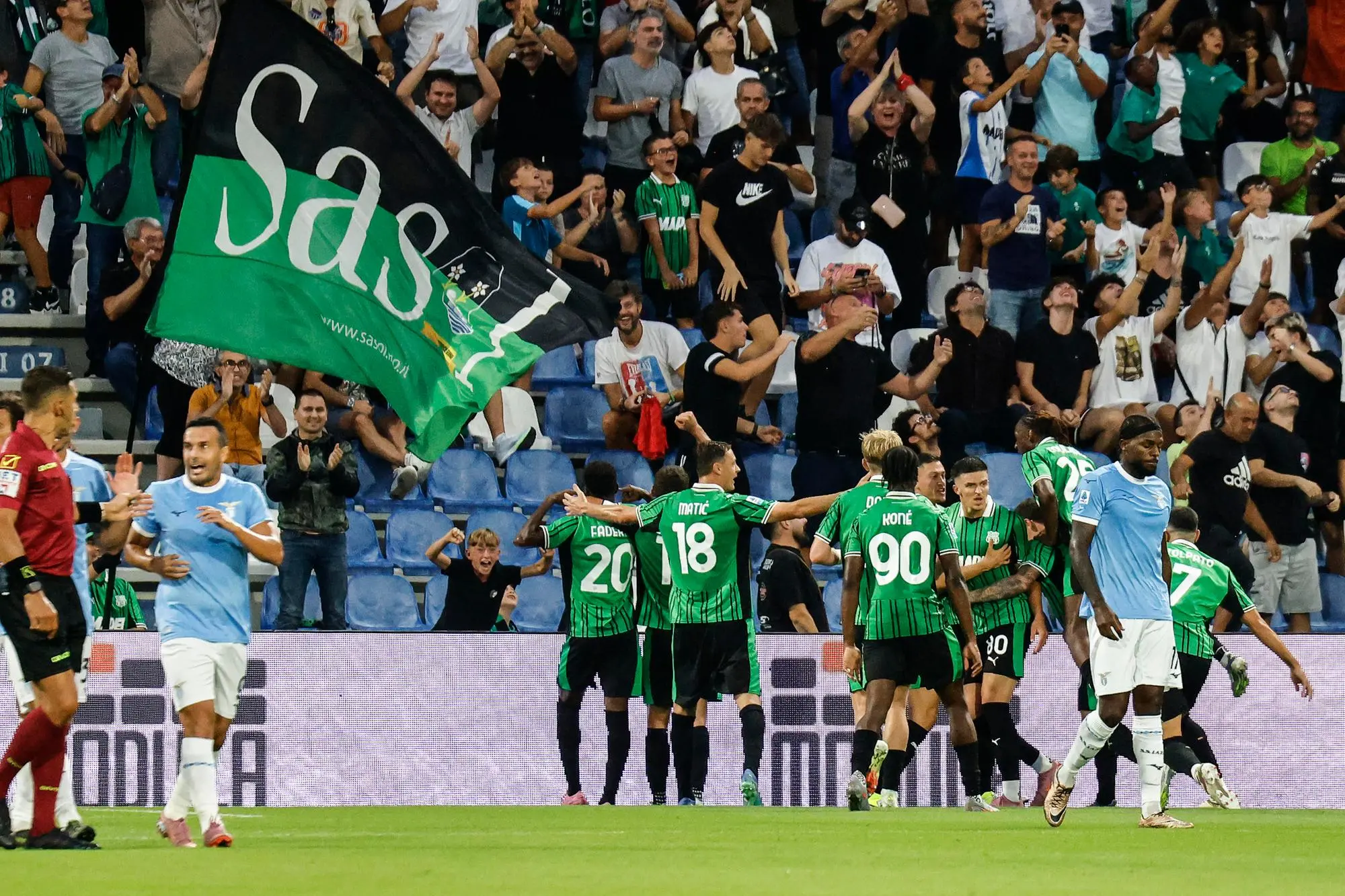 Sassuolo's Alieu Fadera jubilates with his teammates after scoring the goal during the Italian Serie A soccer match US Sassuolo vs SS Lazio at Mapei Stadium in Reggio Emilia, Italy, 14 September 2025. ANSA /ELISABETTA BARACCHI