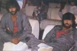Quinto Gambi e Tomas Milian