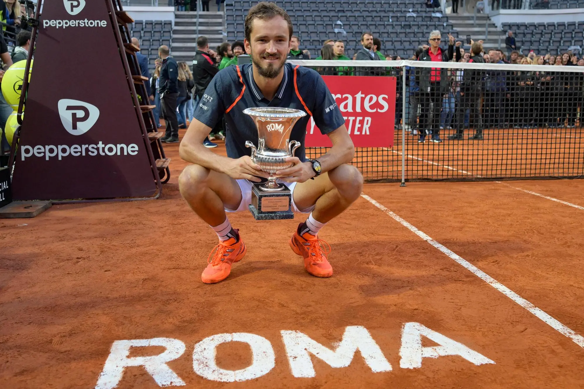 Daniil Medvedev of Russia poses with his trophy after winning his men's singles final match against Holger Rune of Denmark at the Italian Open tennis tournament in Rome, Italy, 21 May 2023. ANSA/ETTORE FERRARI