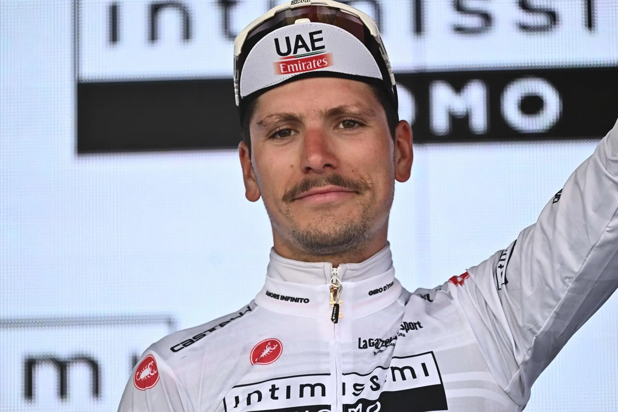 Portuguese rider Joao Almeida of Uae Emirates Team wearing the best young rider's white jersey celebrate on the podium after fifteenth stage of the 2023 Giro d'Italia cycling race over 195 km from Seregno to Bergamo, Italy, 21 May 2023. ANSA/LUCA ZENNARO