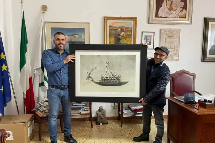 Il quadro con la famosa navicella di Bultei (Foto Caria)