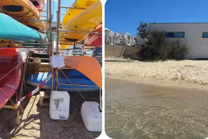 Le canoe sequestrate e la spiaggia vuota dello Scoglio Lungo a Porto Torres (foto Pala)